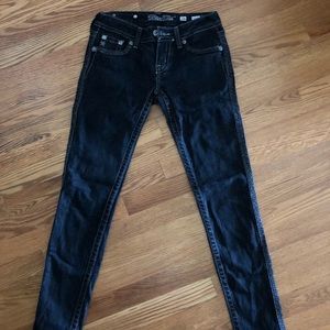 Miss Me skinny black jeans.